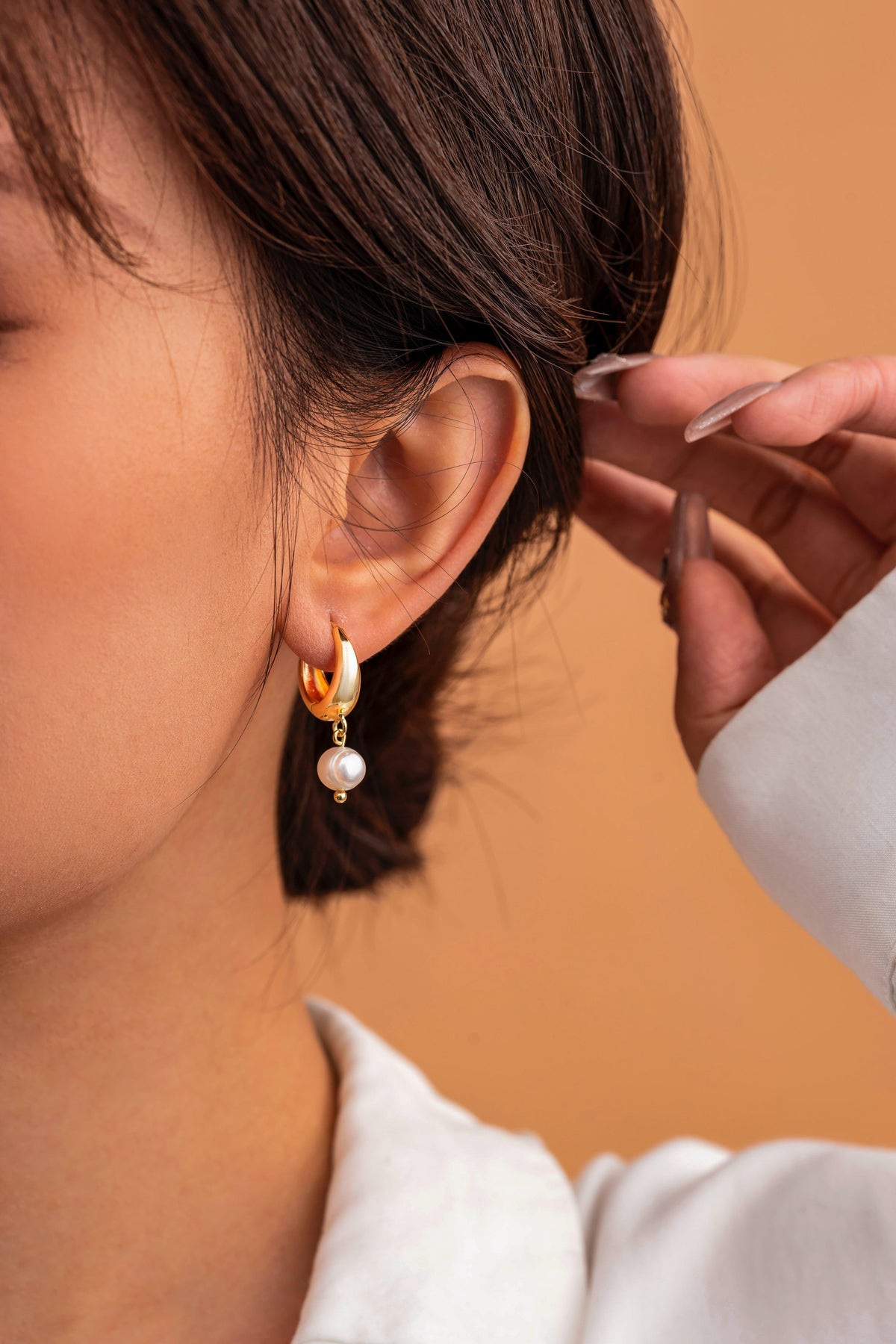 Gold Huggie Pearl Earrings