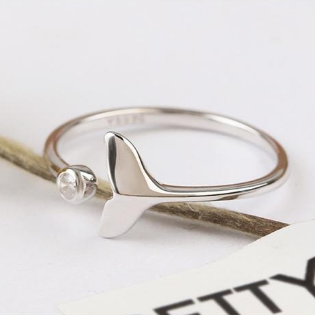 ADJUSTABLE SEA RING WITH ZIRCONS AND A DOLPHIN TAIL