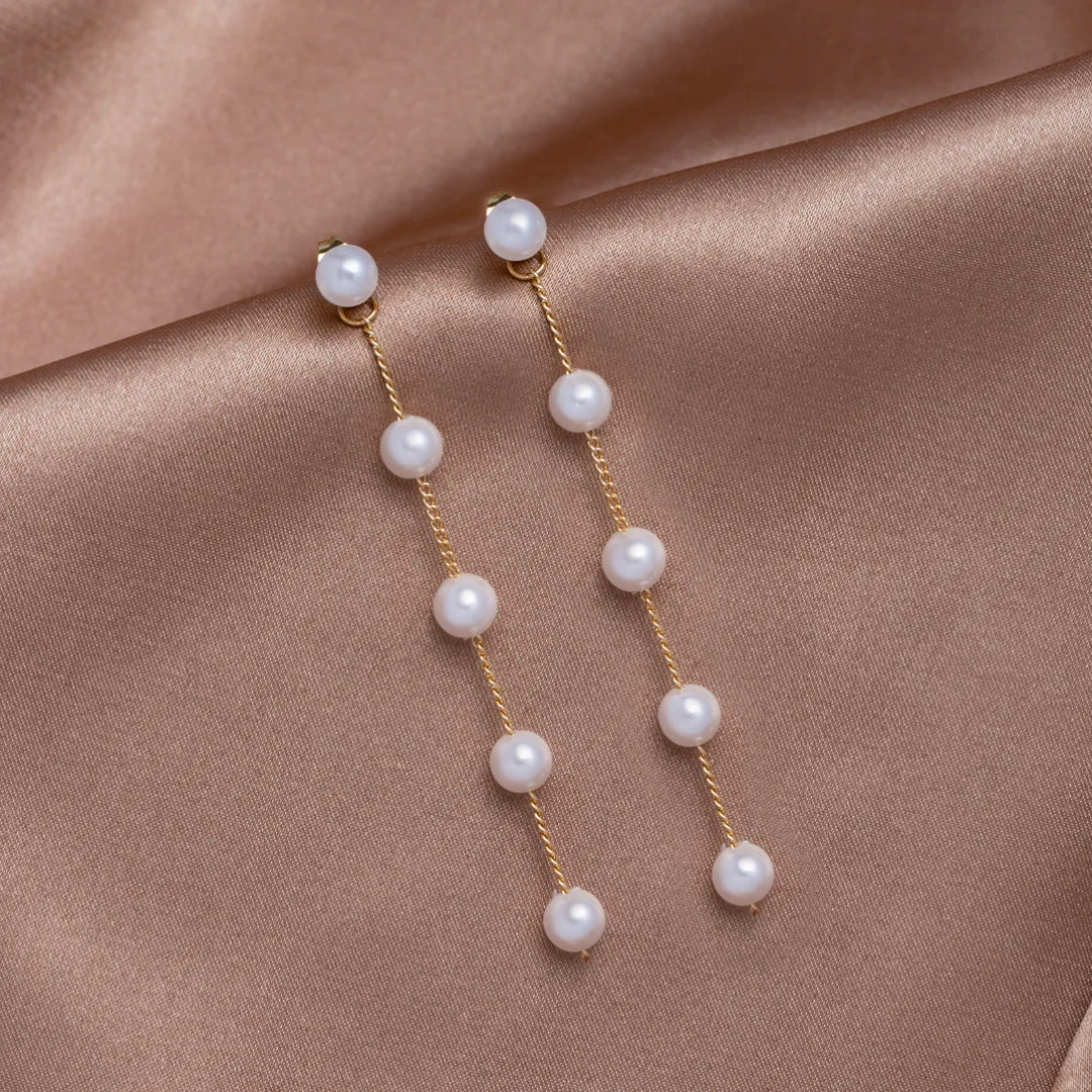 Pearl Dangling in Gold