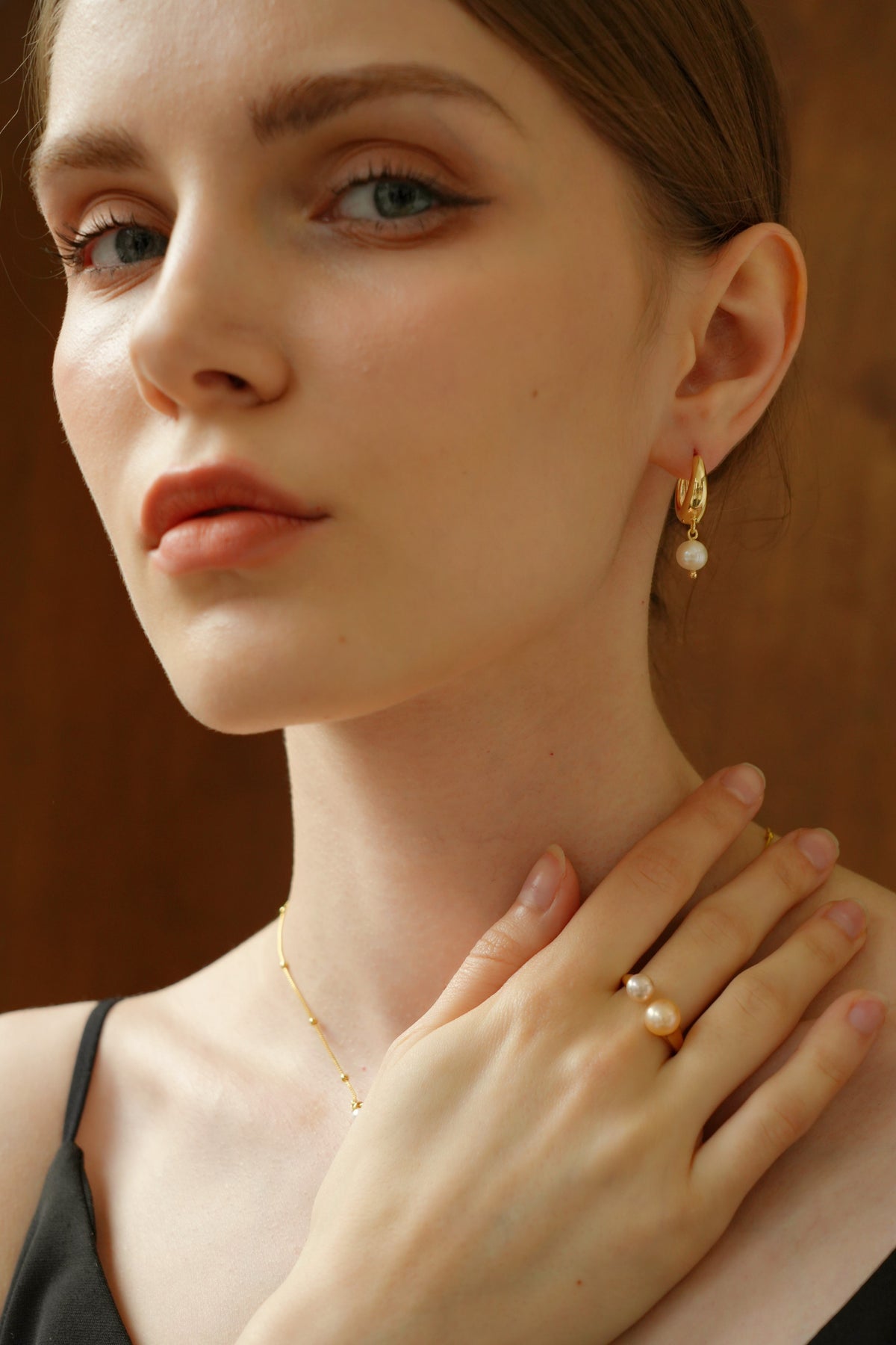 Gold Huggie Pearl Earrings
