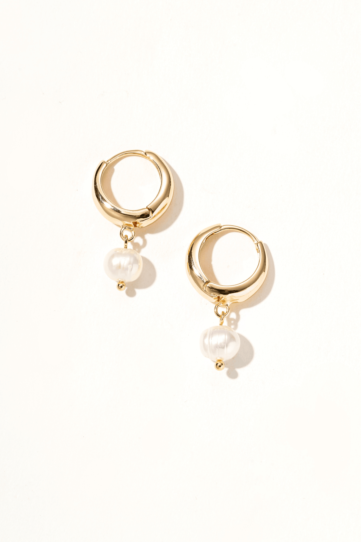 Gold Huggie Pearl Earrings
