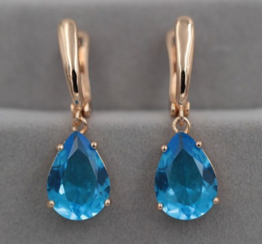 Elegant Blue Crystal in Gold
