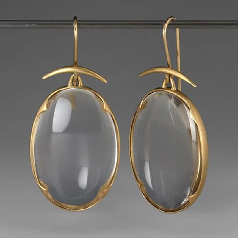 Gold earrings with turquoise stone