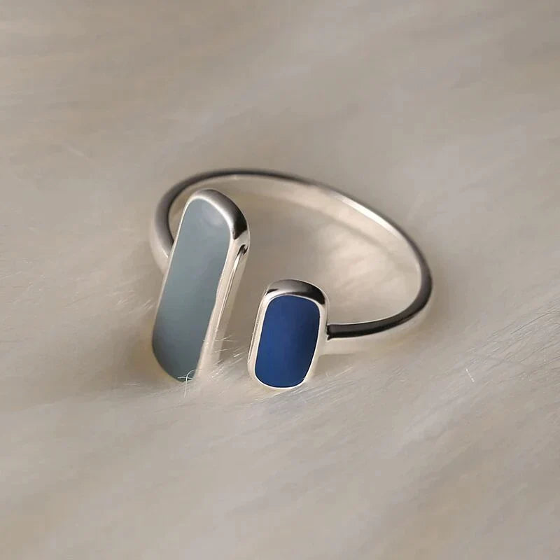 Adjustable silver ring with blue natural stone